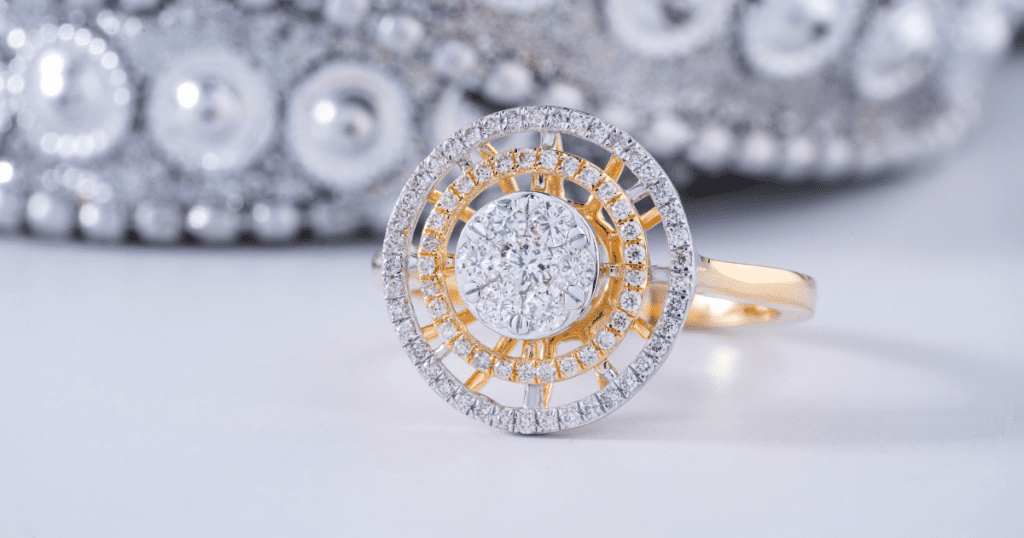 A stunning gold ring featuring a dazzling circular diamond cluster, surrounded by intricate layers of smaller diamonds, set against a white backdrop.