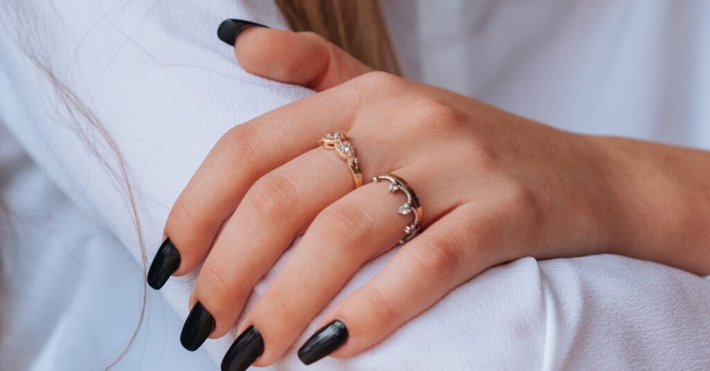 Delicate gold rings with sparkling stones, perfect for stacking or wearing individually.