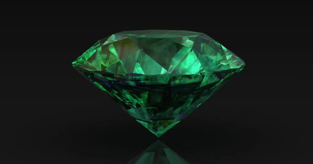 A brilliant green gemstone with intricate facets reflecting vibrant shades of emerald, positioned on a dark surface with a sharp contrast.