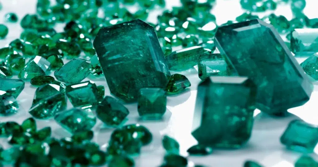 Emerald stones with a translucent quality and a vibrant green color.