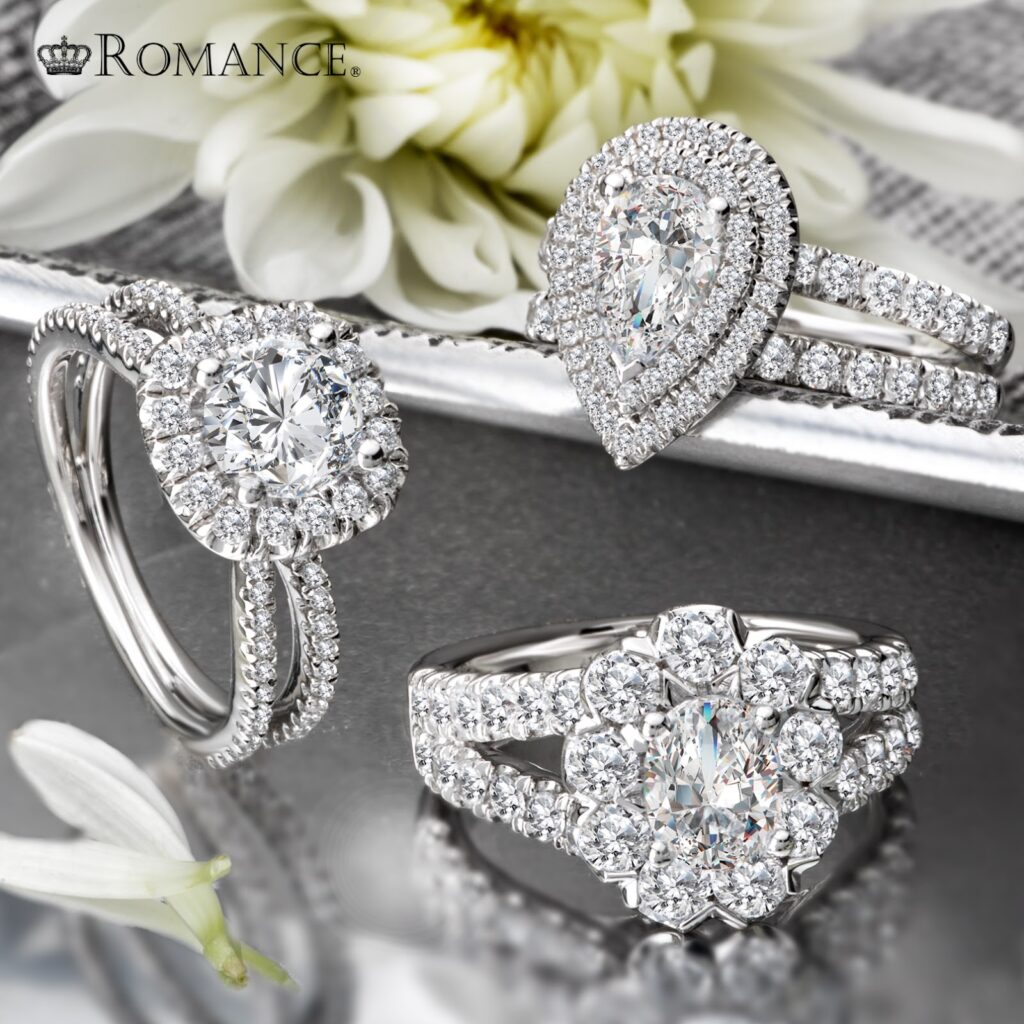 Three exquisite engagement rings from Romance, showcasing a cushion-cut halo ring, a pear-shaped double halo ring, and a radiant-cut cluster ring.