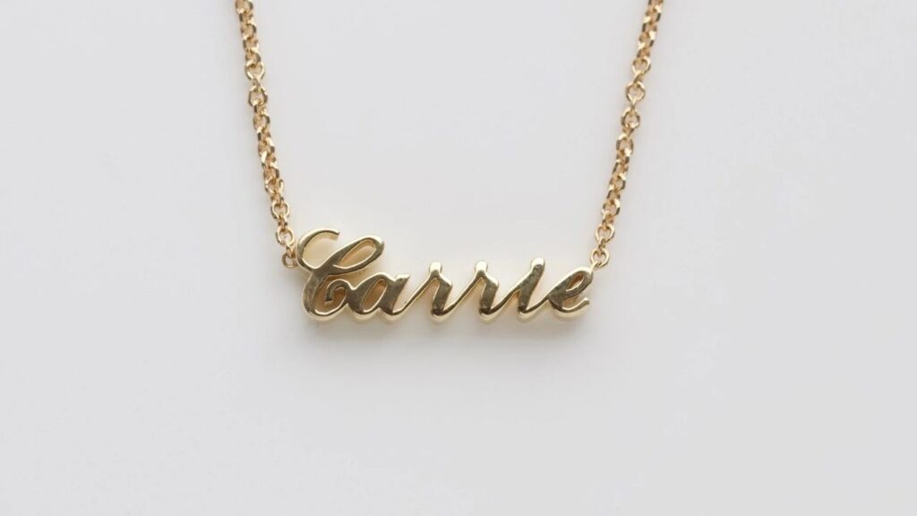 A stylish personalized necklace with the name "Carrie" in a graceful script, making a unique statement.