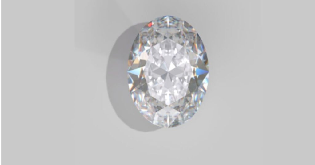 A large, oval-cut diamond with a distinct shadow, displayed against a light gray background.