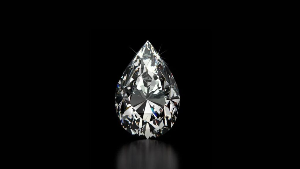 A single, sparkling, pear-shaped diamond with intricate facets, displayed against a glossy black background.