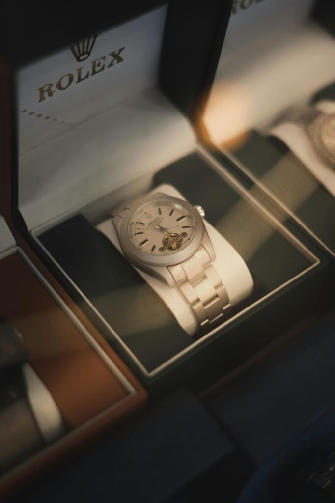 A white Rolex watch in an open box, showcasing Professional watches and impressions from Wulf Diamond Jewelers.