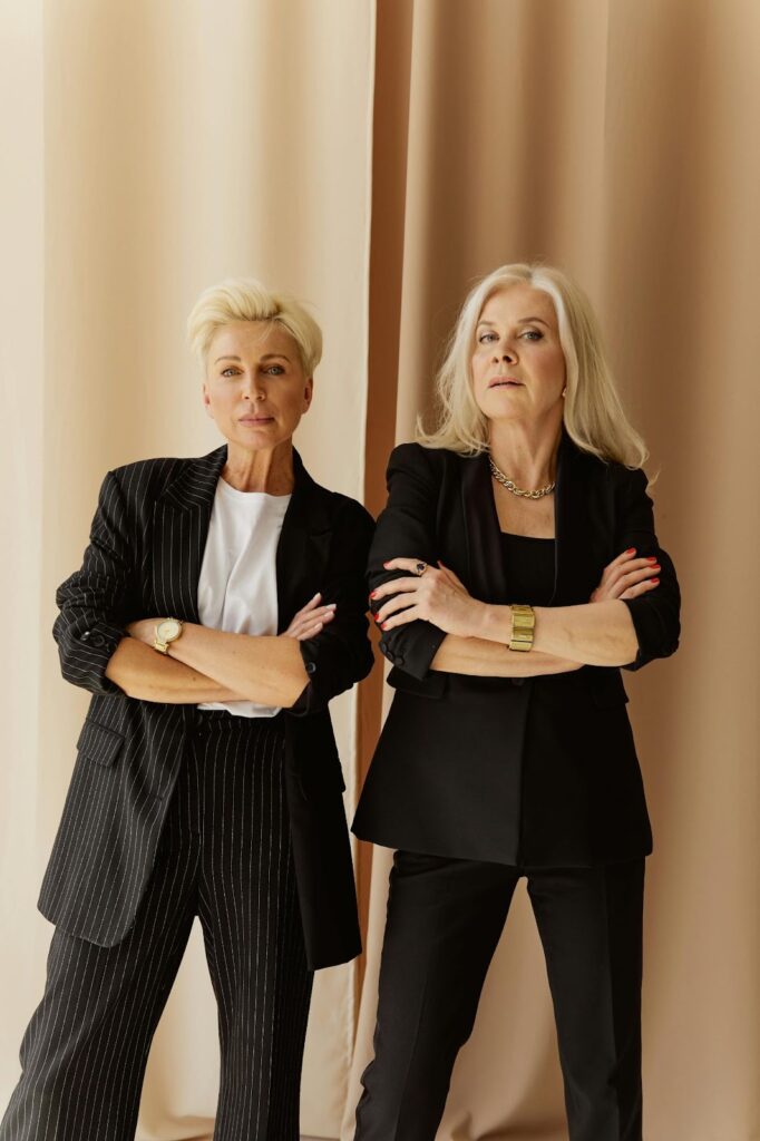 A professional woman with a serious expression and striking jewelry, perfect for Luxury Jewelry for Client Meetings from Wulf Diamond Jewelers.
