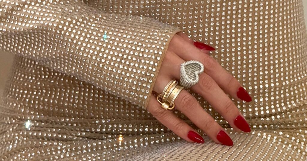 
A close-up of a stylish gold earring, highlighting the importance of proper vacation jewelry storage from Wulf Diamond Jewelers.